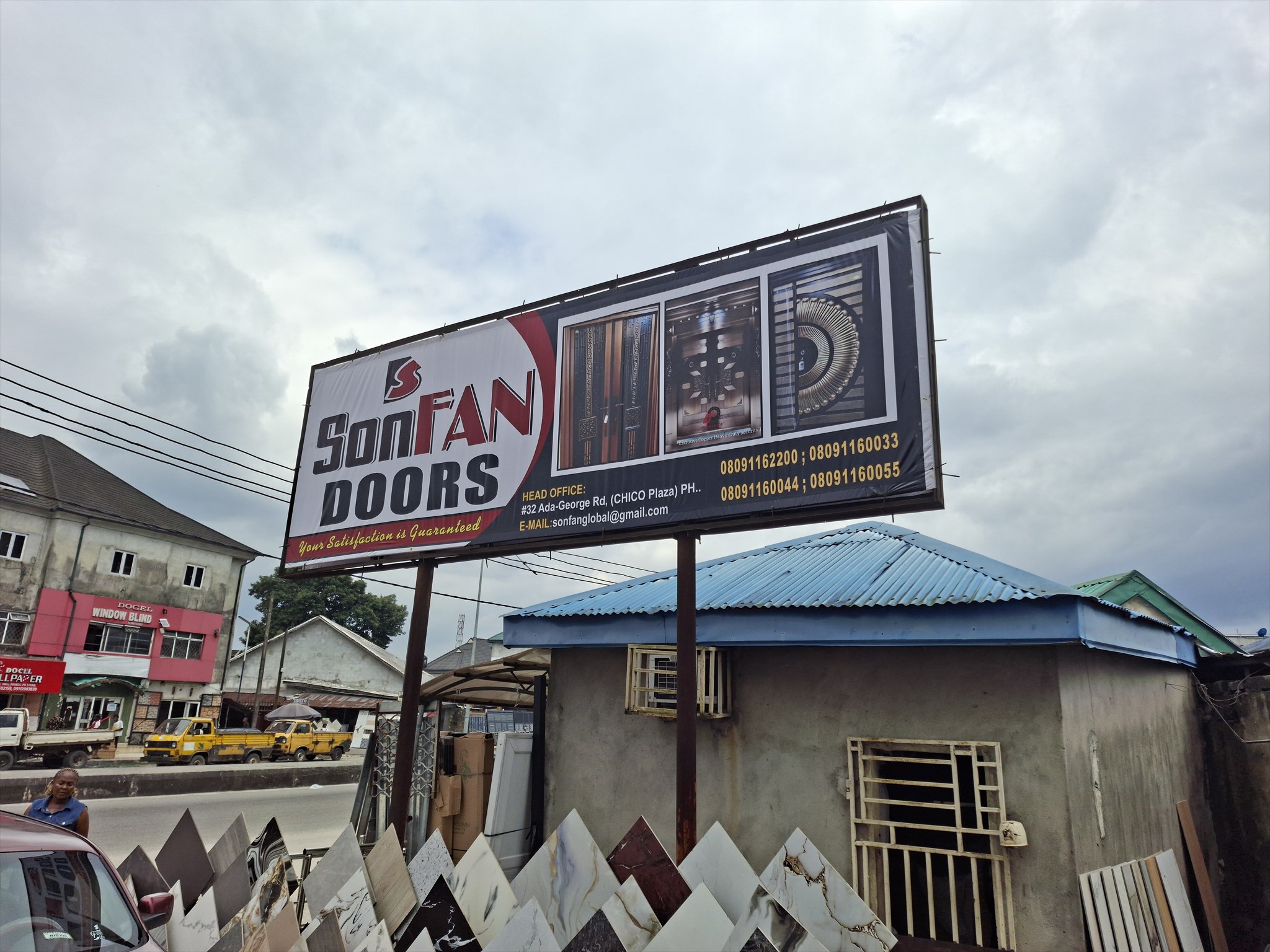 SONFAN GLOBAL DOORS billboard, building, and tile displays